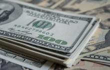 Курс доллара немного снизился на торгах 14 февраля